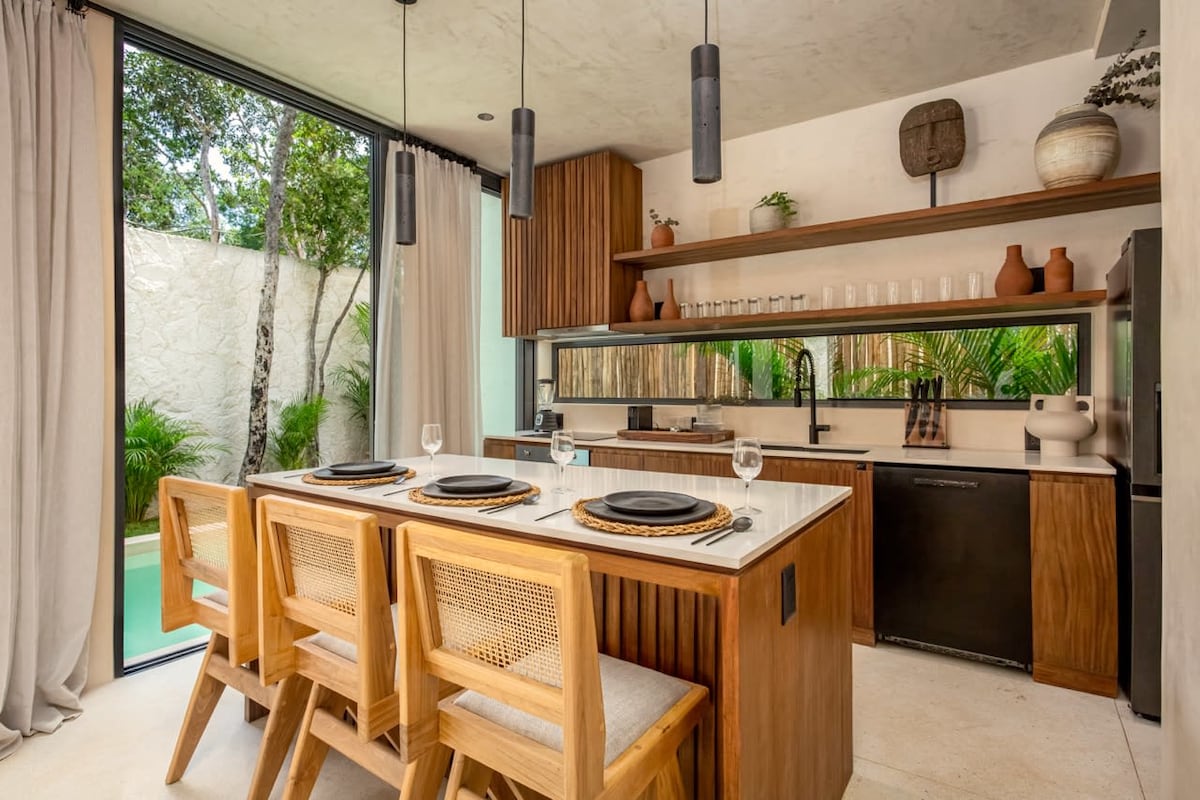 Fully equipped chef's kitchen with modern appliances at Luxury Jungle VIBE Tulum villa